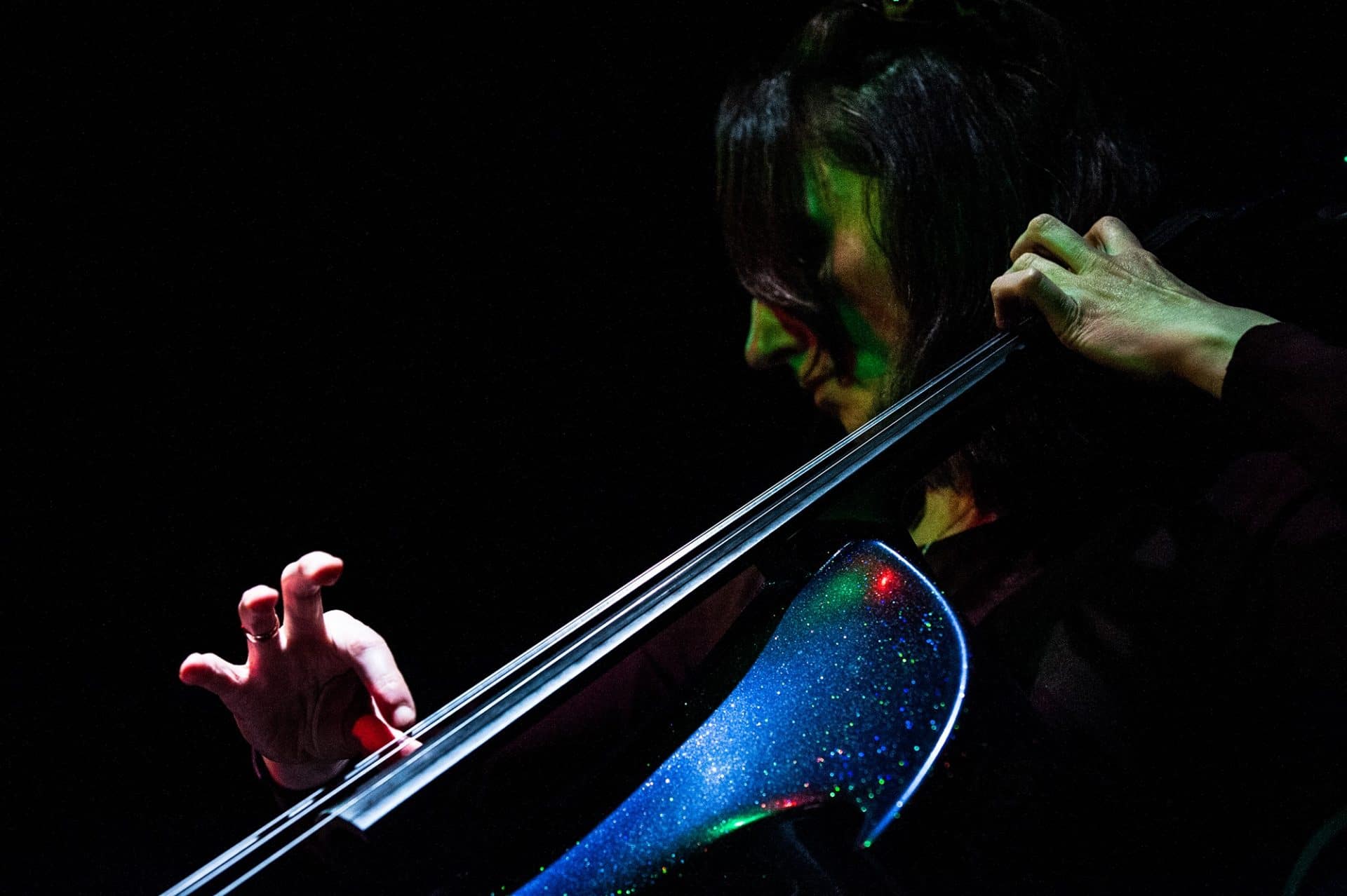 Joanne cox disabled musician Joanne is shrouded in darkness, just her hands on the cello strings are bathed in light